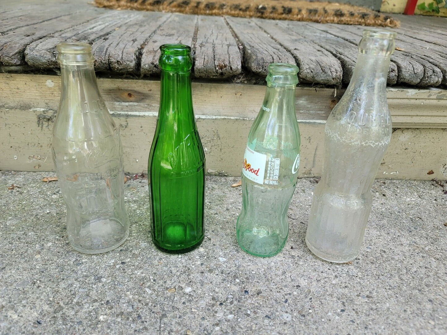 *Lot of 4  VINTAGE Glass Coke Cola Bottles Virgils Dollywood Squeeze