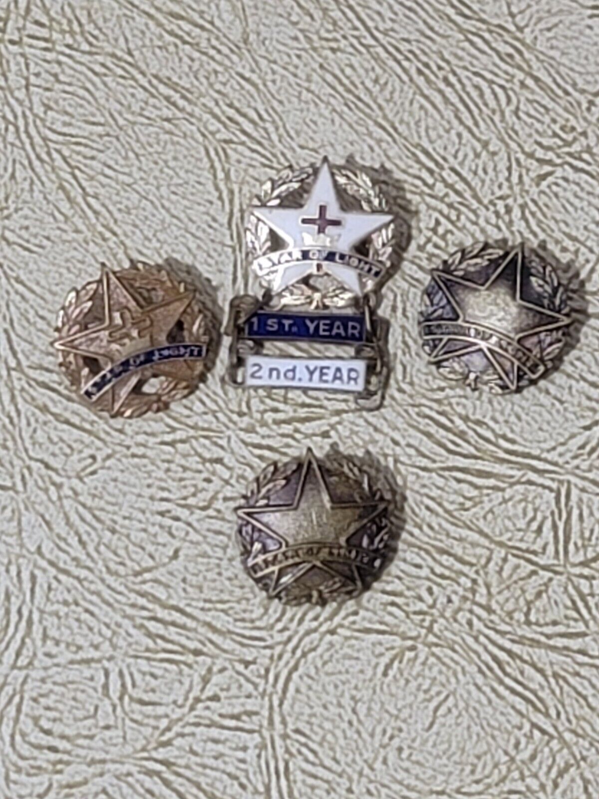 Lot of 4 Star of Light First Year VINTAGE Collectible Enameled Lapel Pin badge