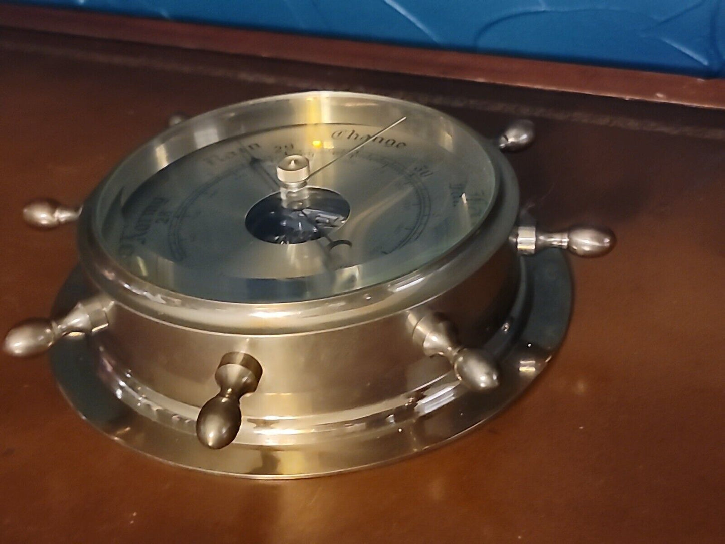 Lacquered Brass Ship's Wheel Barometer With Beveled Glass