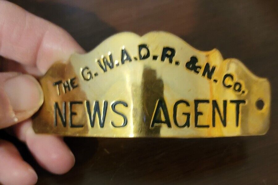 VINTAGE ARMSTRON NEWS  COMPANY AGENT HAT BADGE G.W.A.D.R.&N.  COMPANY Badge Pin 