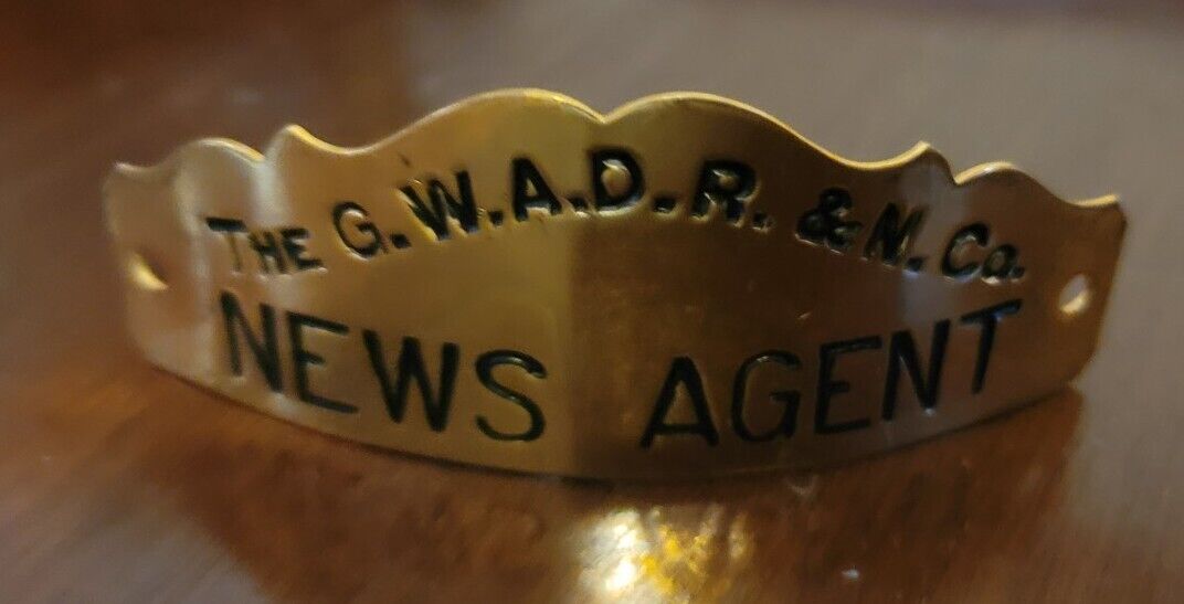 VINTAGE ARMSTRON NEWS  COMPANY AGENT HAT BADGE G.W.A.D.R.&N.  COMPANY Badge Pin 